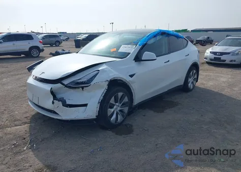 2023 Tesla Model Y Awd/Long Range Dual Motor All-Wheel Drive z USA, uszkodzony, nr VIN 7SAYGDEE4PA045903